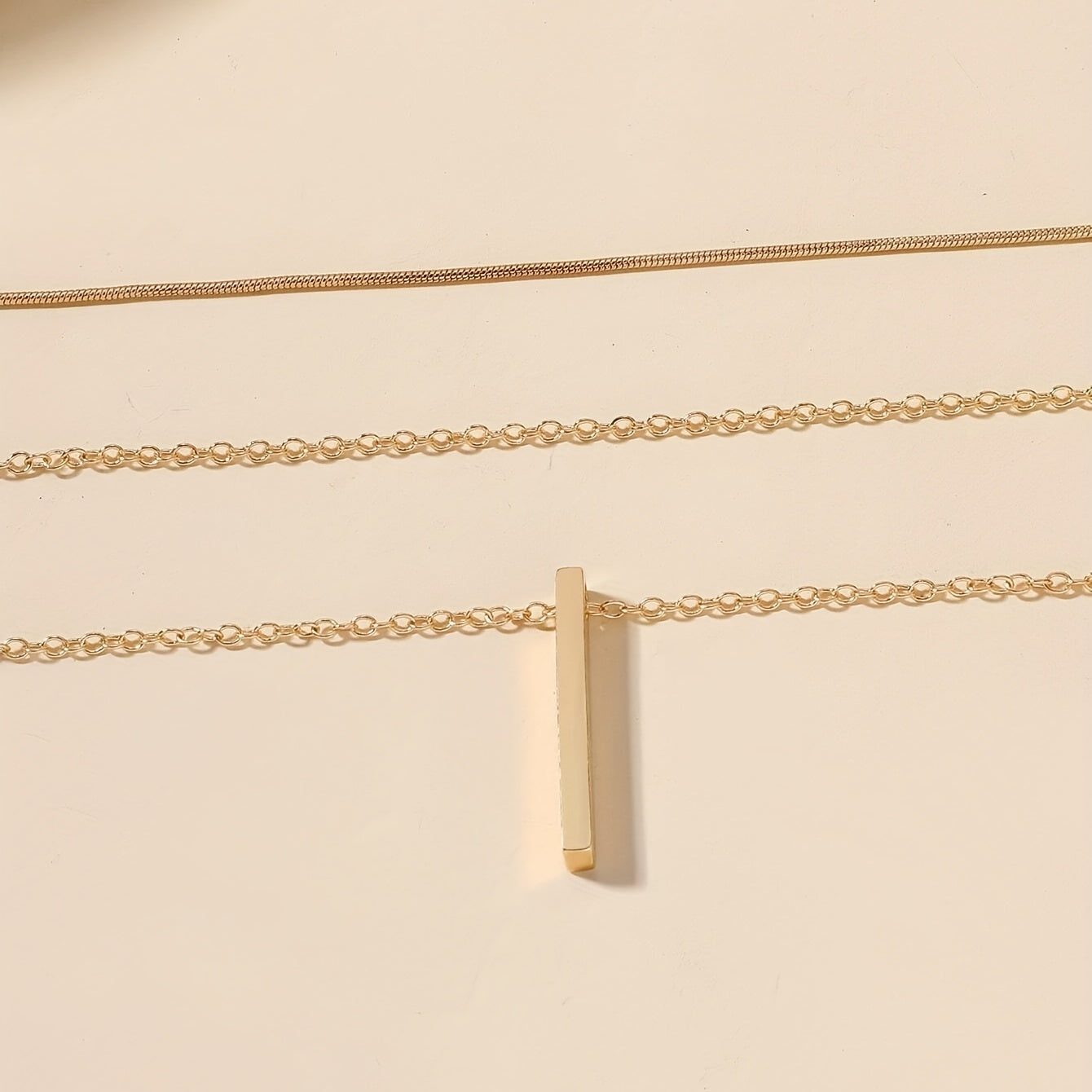 Collar Triple Y con Colgante Minimalista Euro – Bañado en oro de 18k