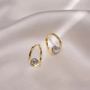 Aretes de Aro con Circonia Aura Dorada – Bañado en oro de 18k
