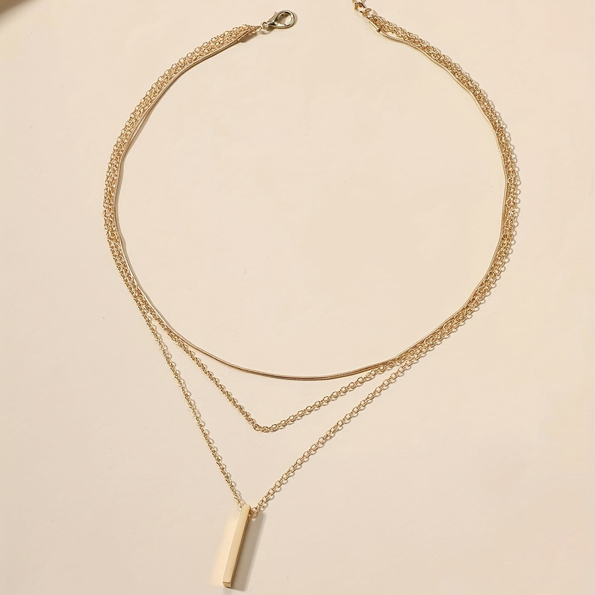 Collar Triple Y con Colgante Minimalista Euro – Bañado en oro de 18k